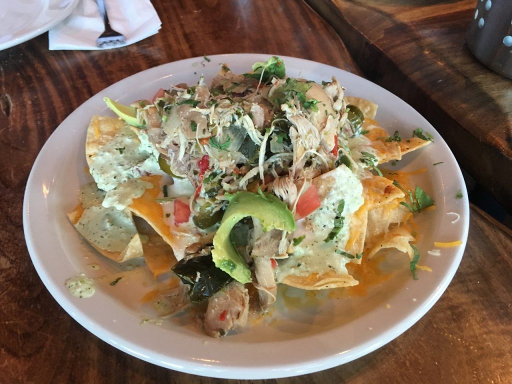 Plate of signature nachos at Sammy's Bistro.